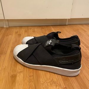 Adidas Black Trainers, never worn (bought in size too large abroad). Size 9.